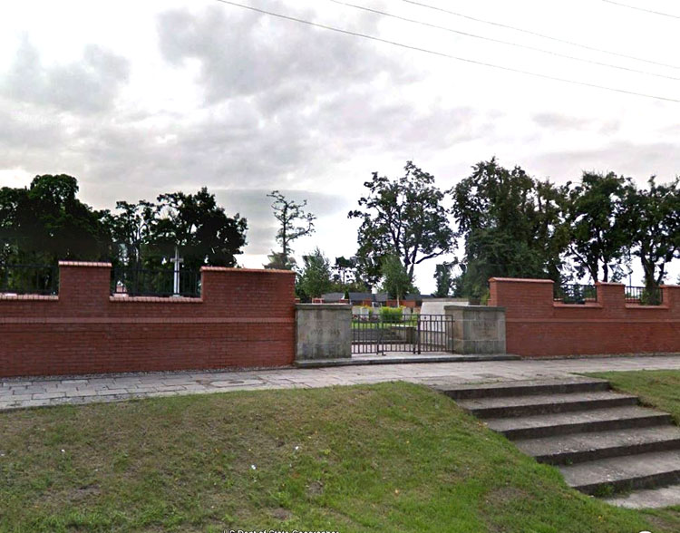 The Malbork Memorial seen beside the entrance gate to Malbork Cemetery
